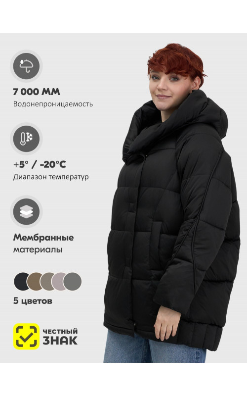Женский зимний пуховик свободного кроя.