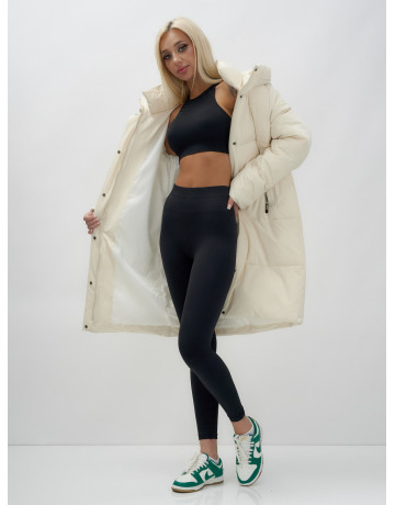 Тёплый женский пуховик с капюшоном до колена.