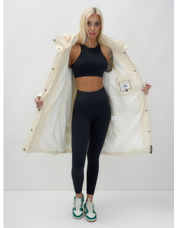 Тёплый женский пуховик с капюшоном до колена.