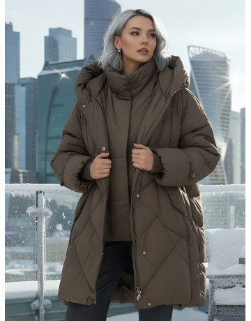 Длинный женский пуховик для зимы.