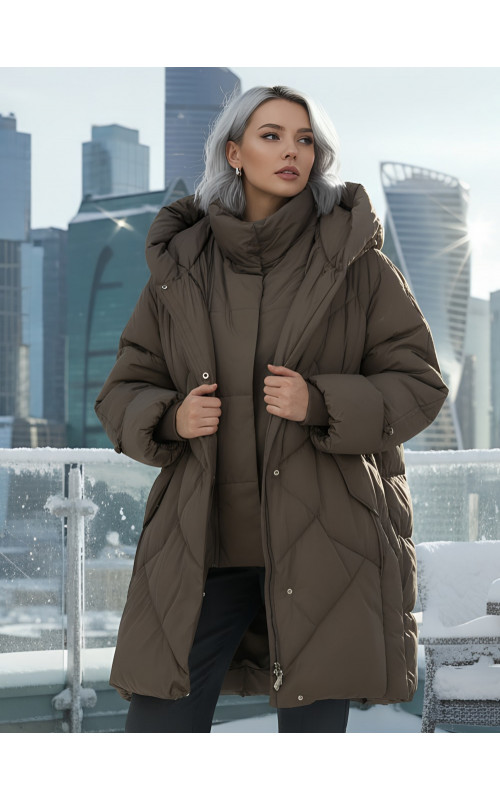 Длинный женский пуховик для зимы.