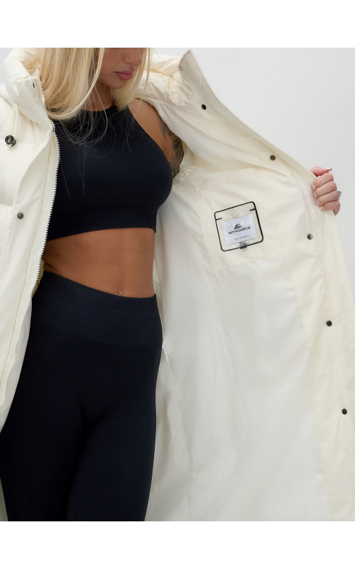 Длинный зимний пуховик с капюшоном для женщин.