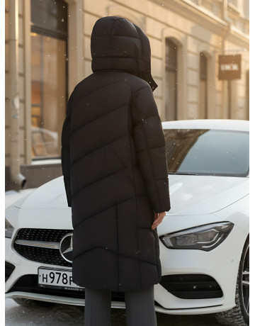 Длинный женский пуховик с капюшоном для зимы