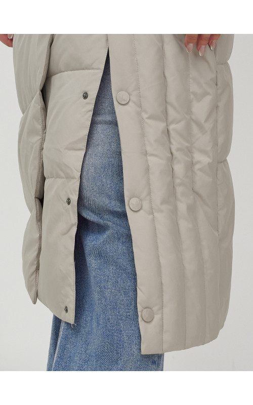 Длинный женский пуховик с мехом енота.